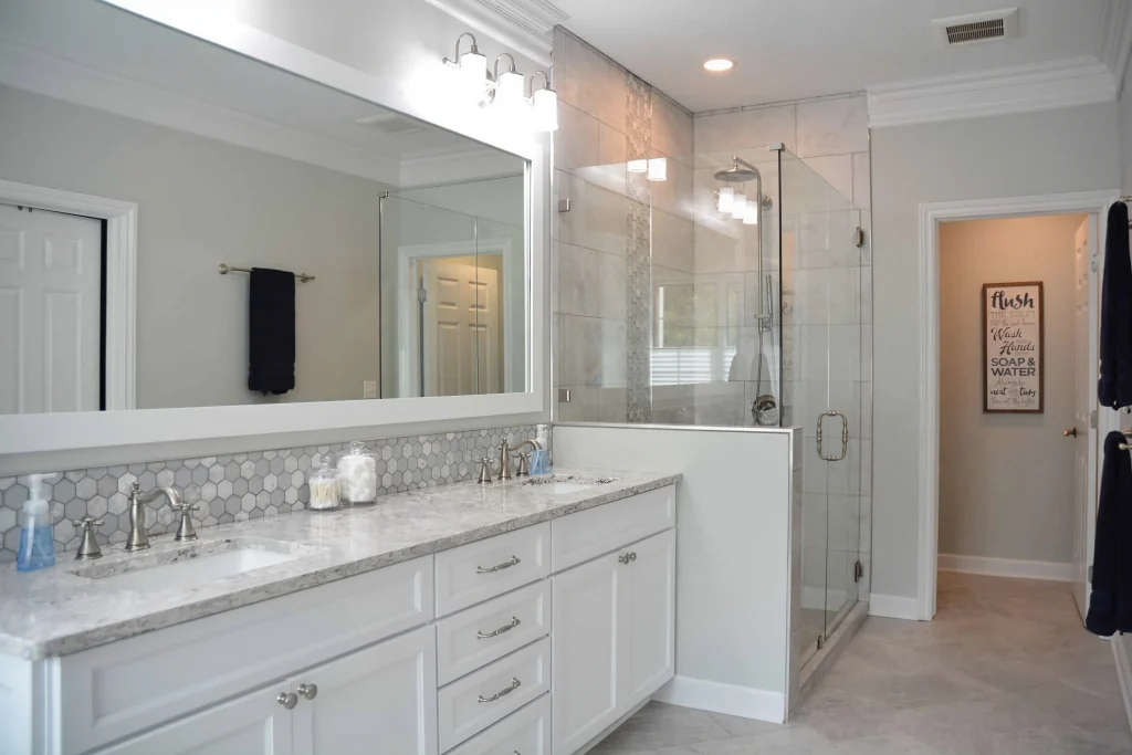 Bright remodeled bathroom designed by McDaniels Kitchen and Bath
