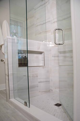 custom shower design with glass door